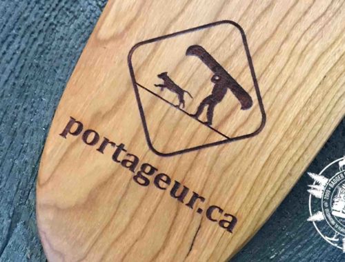Laser engraved Portageur.ca paddle